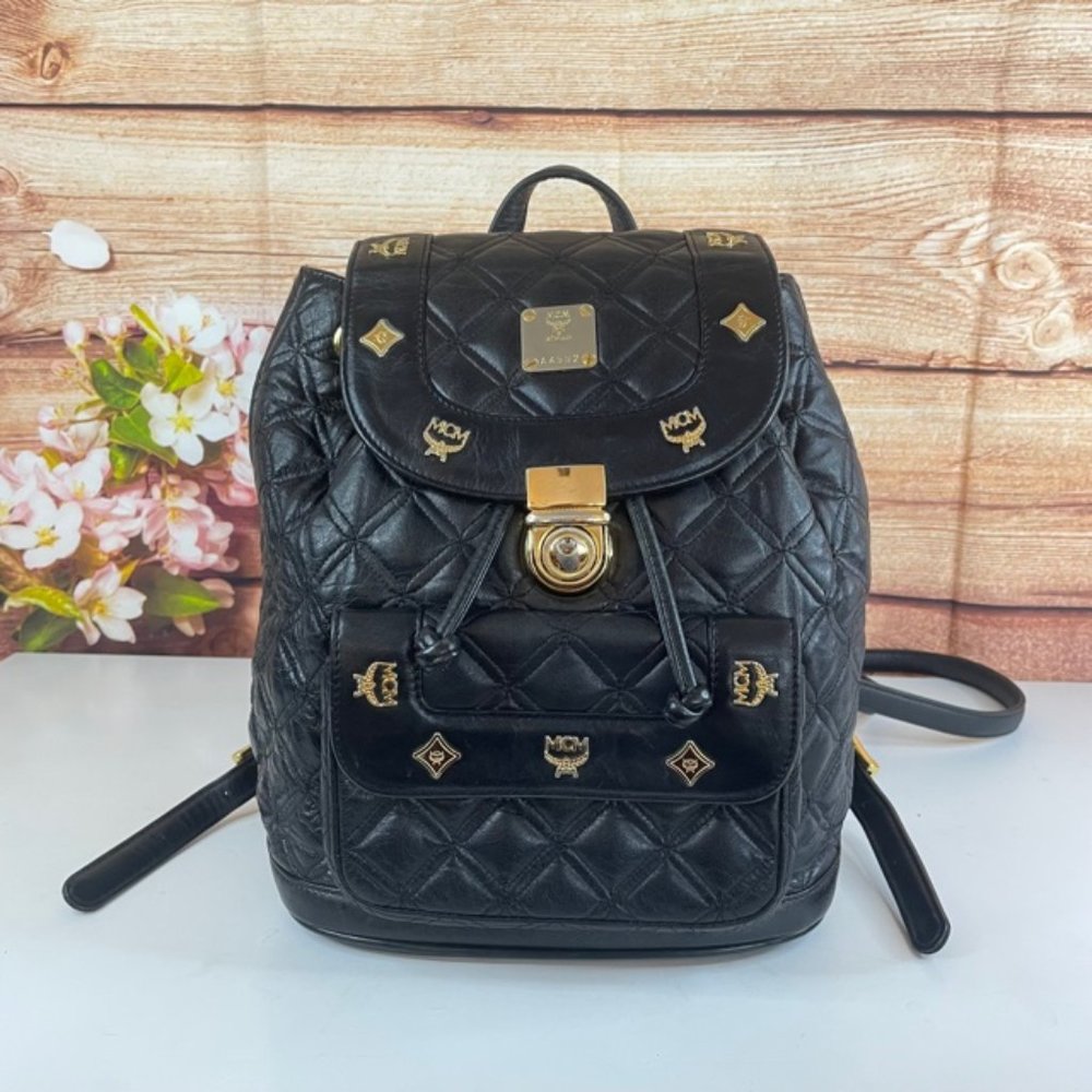 M C M Black Quilted Backpack with Gold Accents
